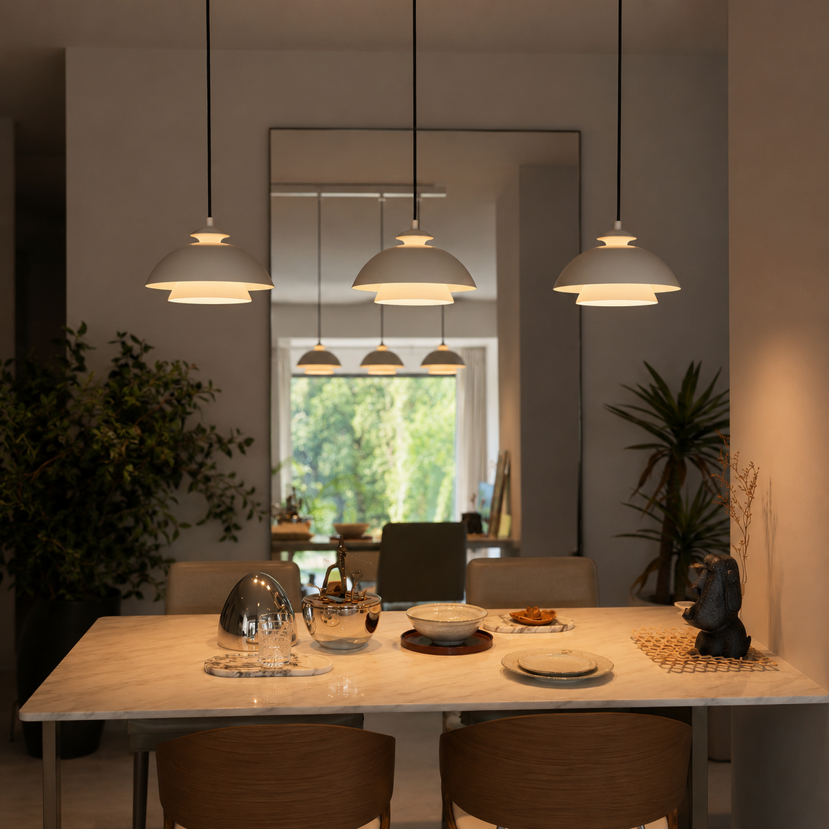 Black dome pendant light with shield shade, hanging on cords