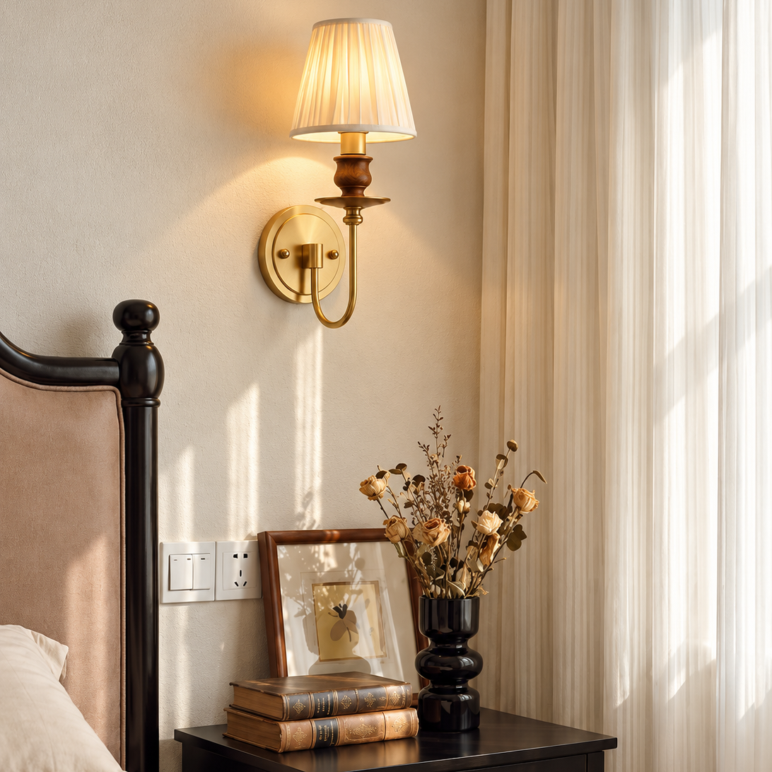 1-light brass wall sconce with pleated drum shade and round backplate