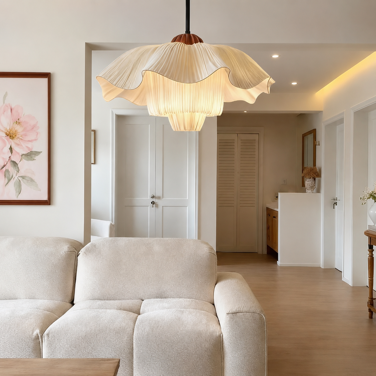 French linen pendant light with layered scalloped linen shades and warm illumination.