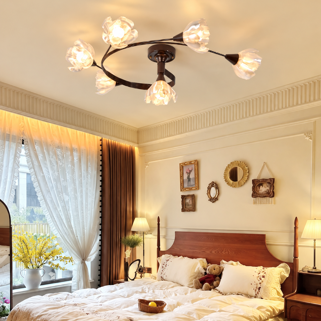Semi-flush chandelier with floral branch design and frosted flower shades on ceiling