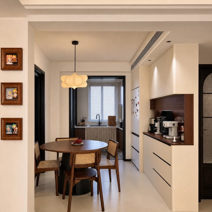 Sculptural silk petal pendant light with soft beige shades hanging in a kitchen dining area