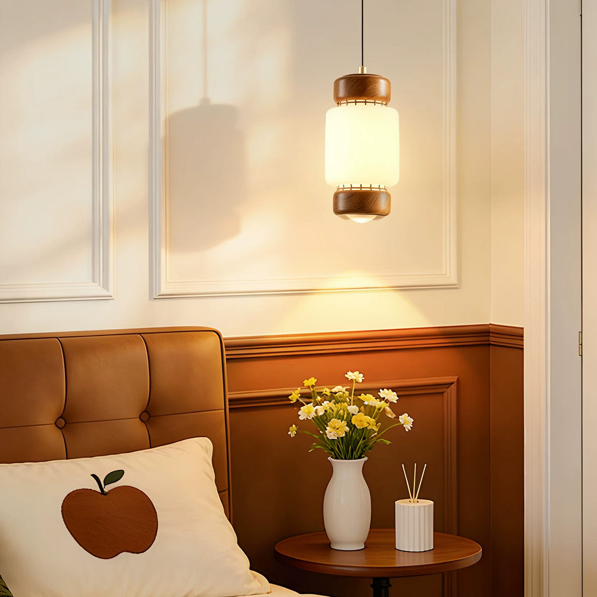 Ceiling pendant light with frosted glass cylinder shade and walnut top and bottom rings