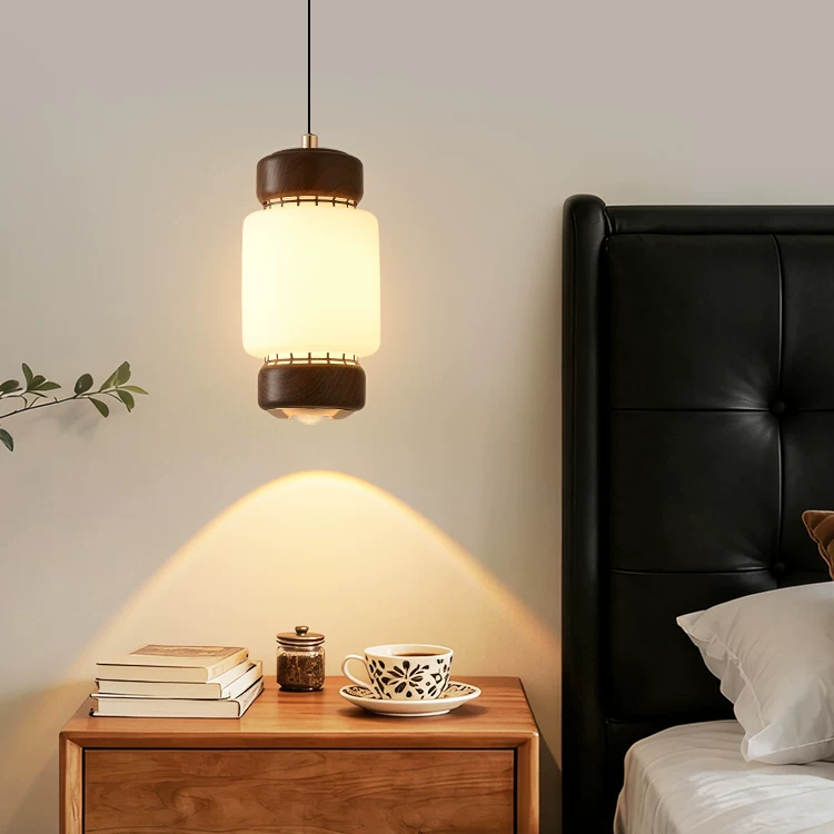Mini pendant light with frosted glass cylinder shade and walnut top and bottom bands
