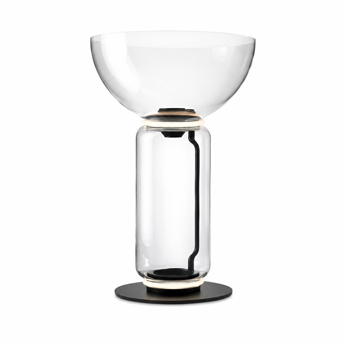 Glass floor lamp with clear bowl shade over a glass cylinder and black base.