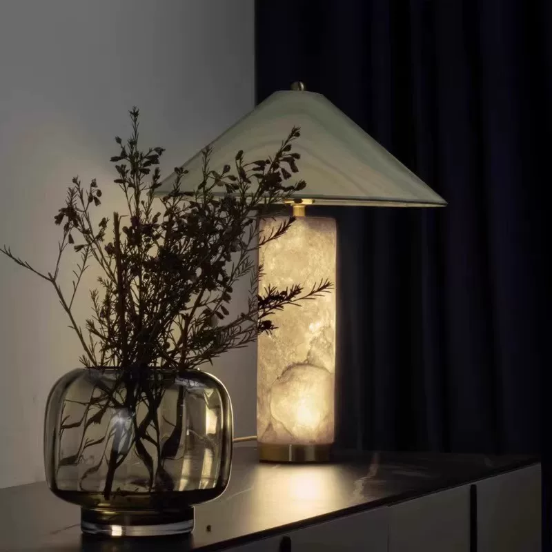 Green glass shade column table lamp with lit alabaster column and brass base