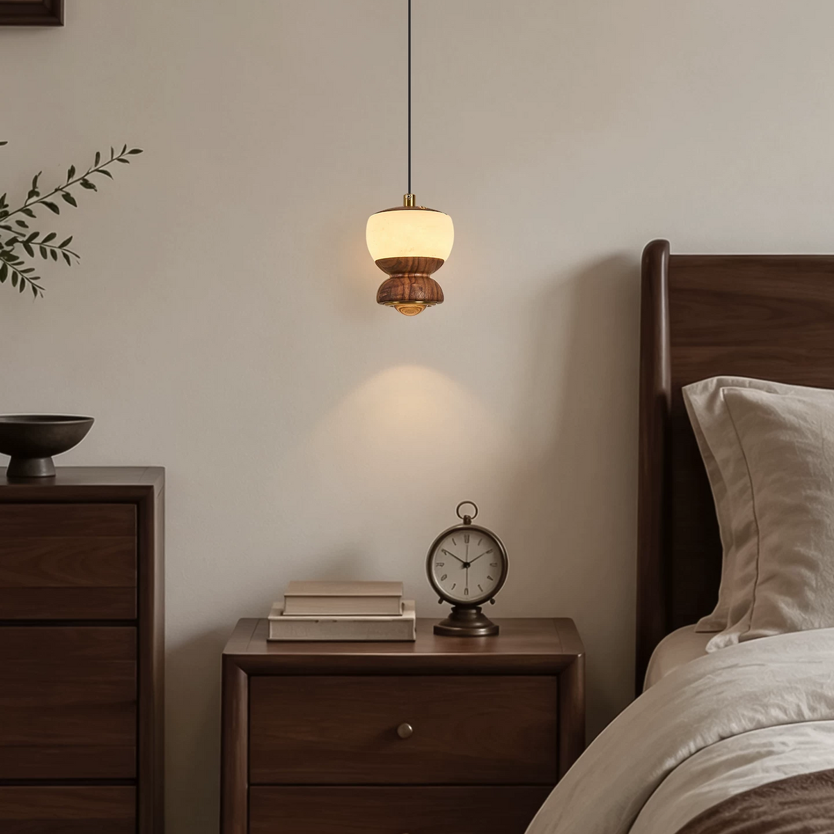 Walnut mini pendant light with frosted glass shade, warm glow