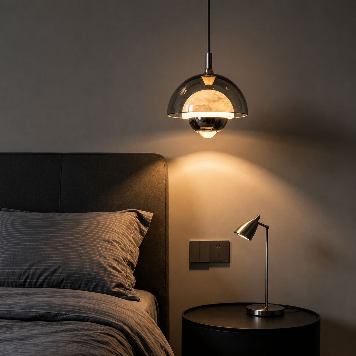 One bronze pendant light with round glass dome shade
