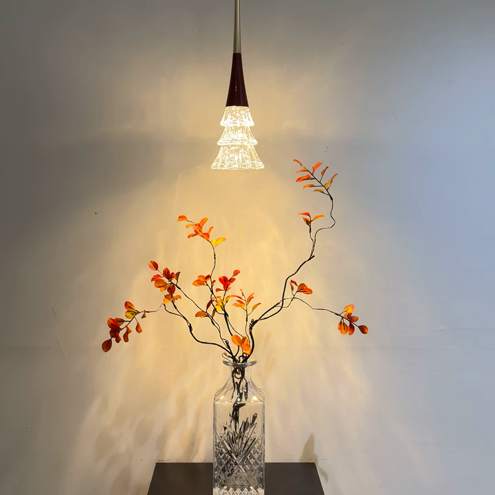 Ruby red and crystal tree rise-and-fall pendant light with warm glow