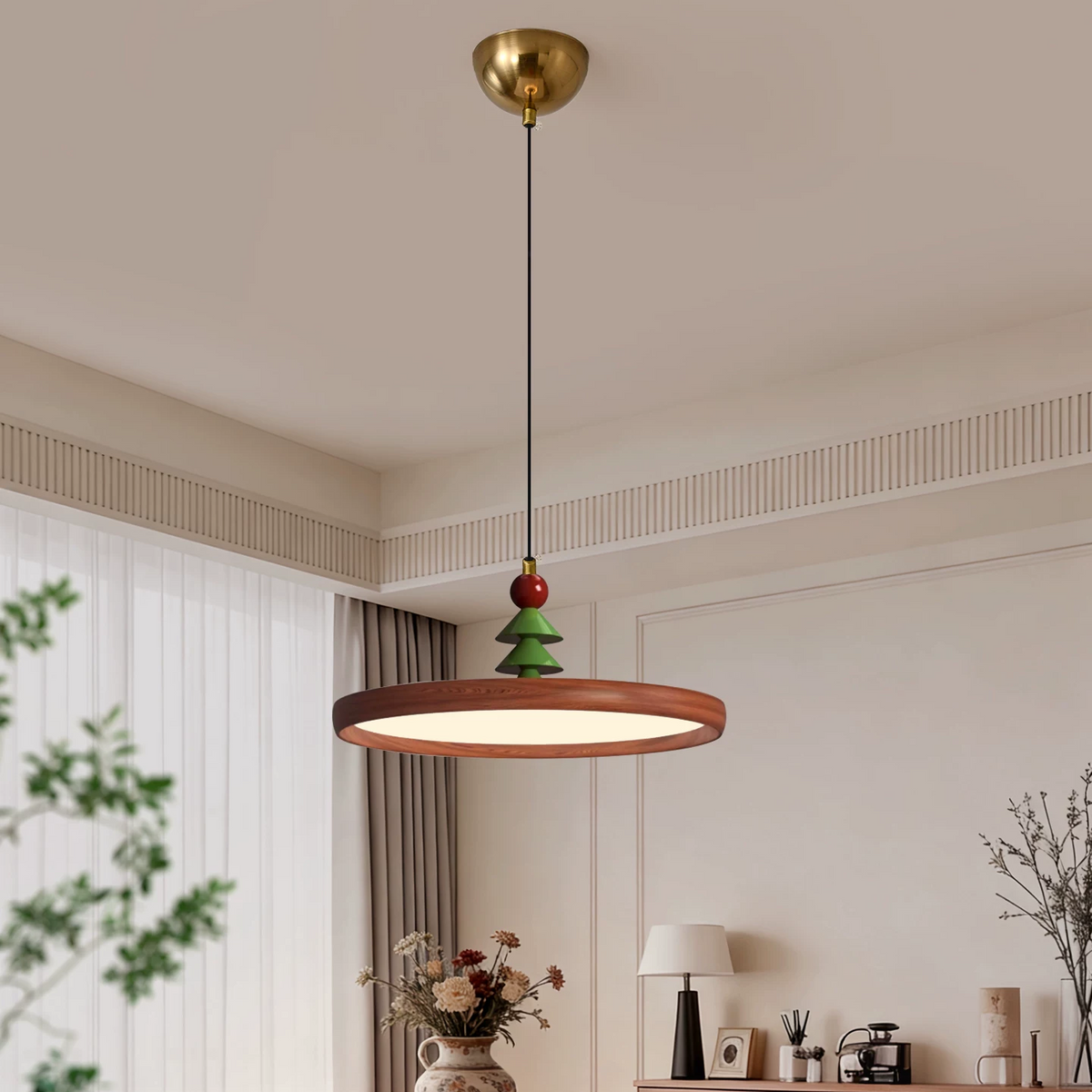 Single wood disc pendant light with pine-tree topper, red bead detail and gold canopy