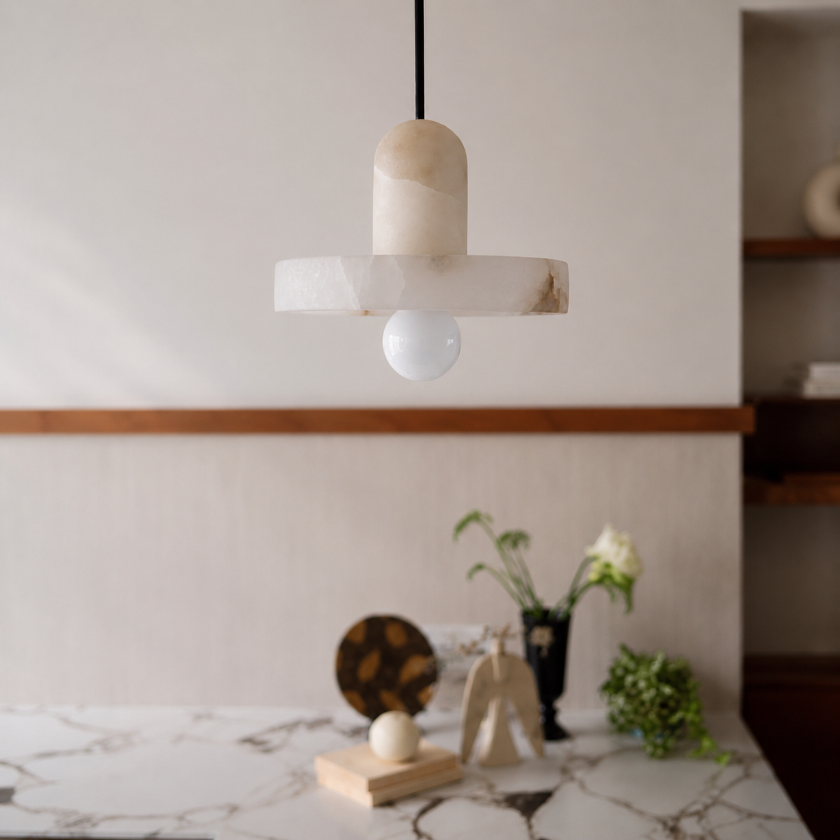 Alabaster fishline pendant light with cylindrical shade and horizontal stone crossbar