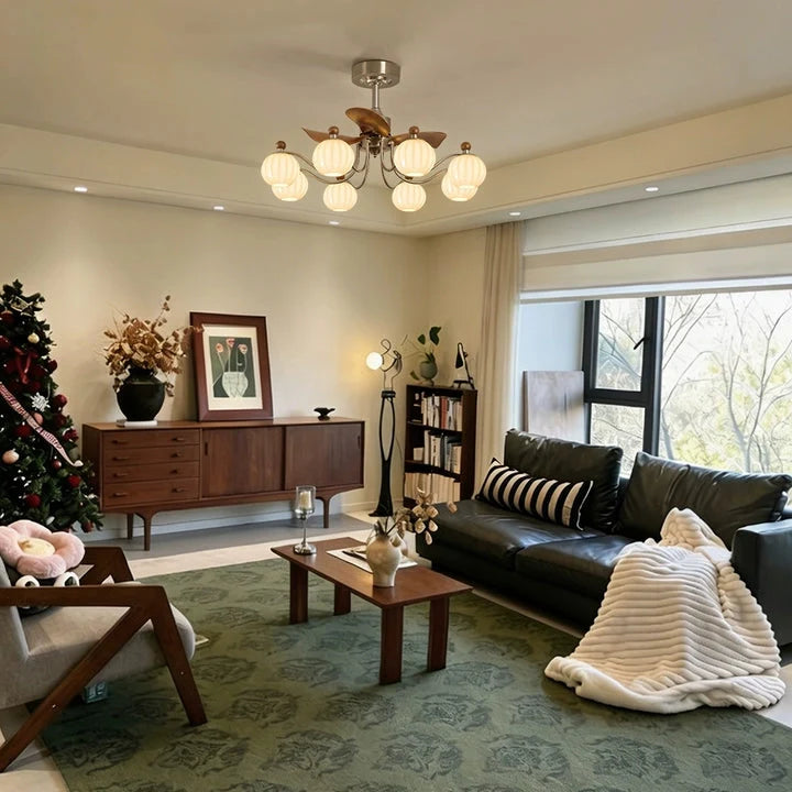 8-light ceiling fan chandelier with frosted globe shades, bronze blades, and metal arms
