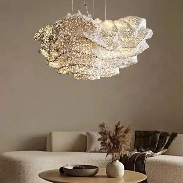 Cloud-shaped pendant light with layered silver-white shade and speckled texture