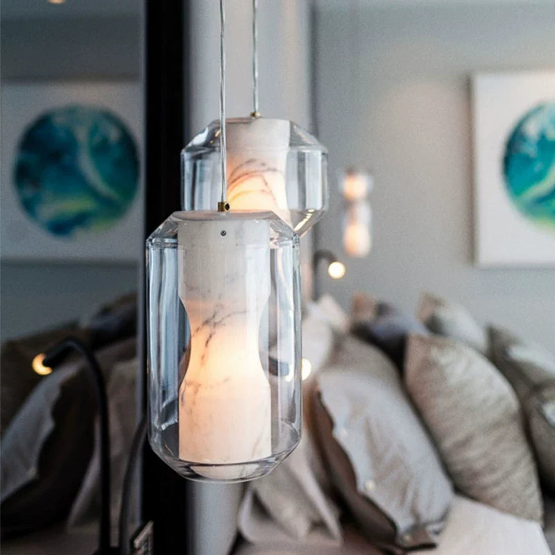 Solene alabaster and glass pendant light with clear faceted shade and warm glow