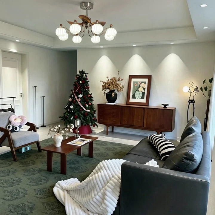 Ceiling fan chandelier with bronze blades and eight frosted glass globe lights