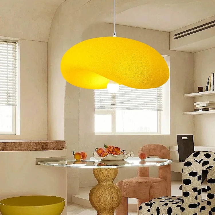 Mustard yellow organic disc pendant light with soft fabric disc shade and hanging cord