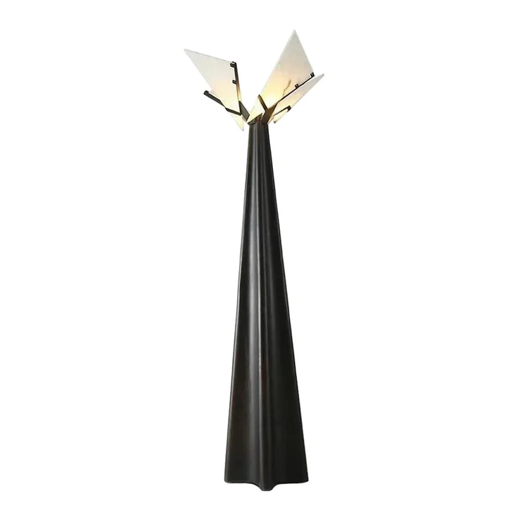 Black floor lamp with four white shade panels and multi-spoke base, arched silhouette.