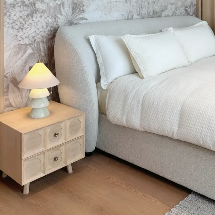 Carved jade-style tree table lamp with cream fabric shade and sculpted carved base