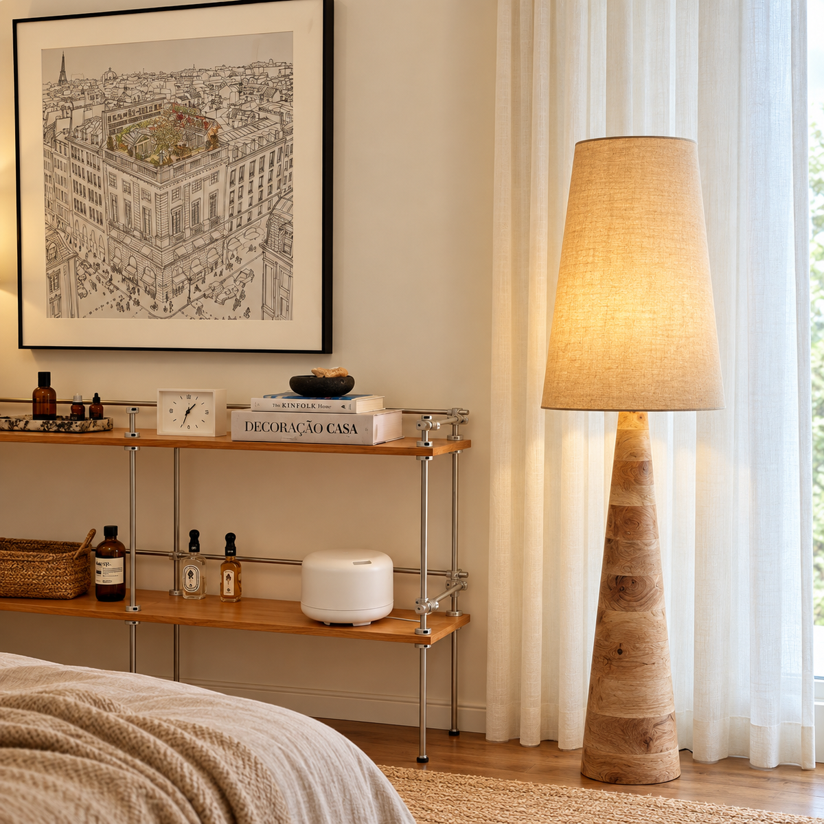 Wood floor lamp with beige fabric drum shade and tapered carved base
