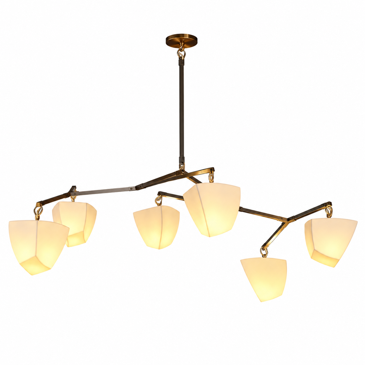 Brass branching chandelier with multiple frosted white shades against white background