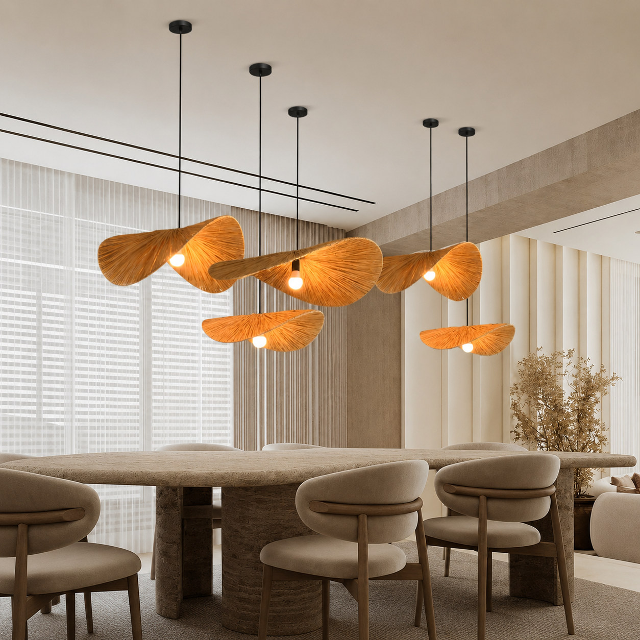 Cluster of rattan disc pendant lights with warm woven shades and glowing bulbs