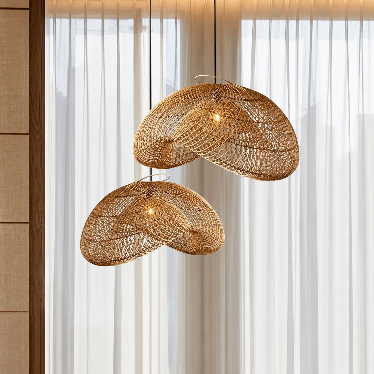 Natural rattan dome pendant light with two woven shades, warm glow.