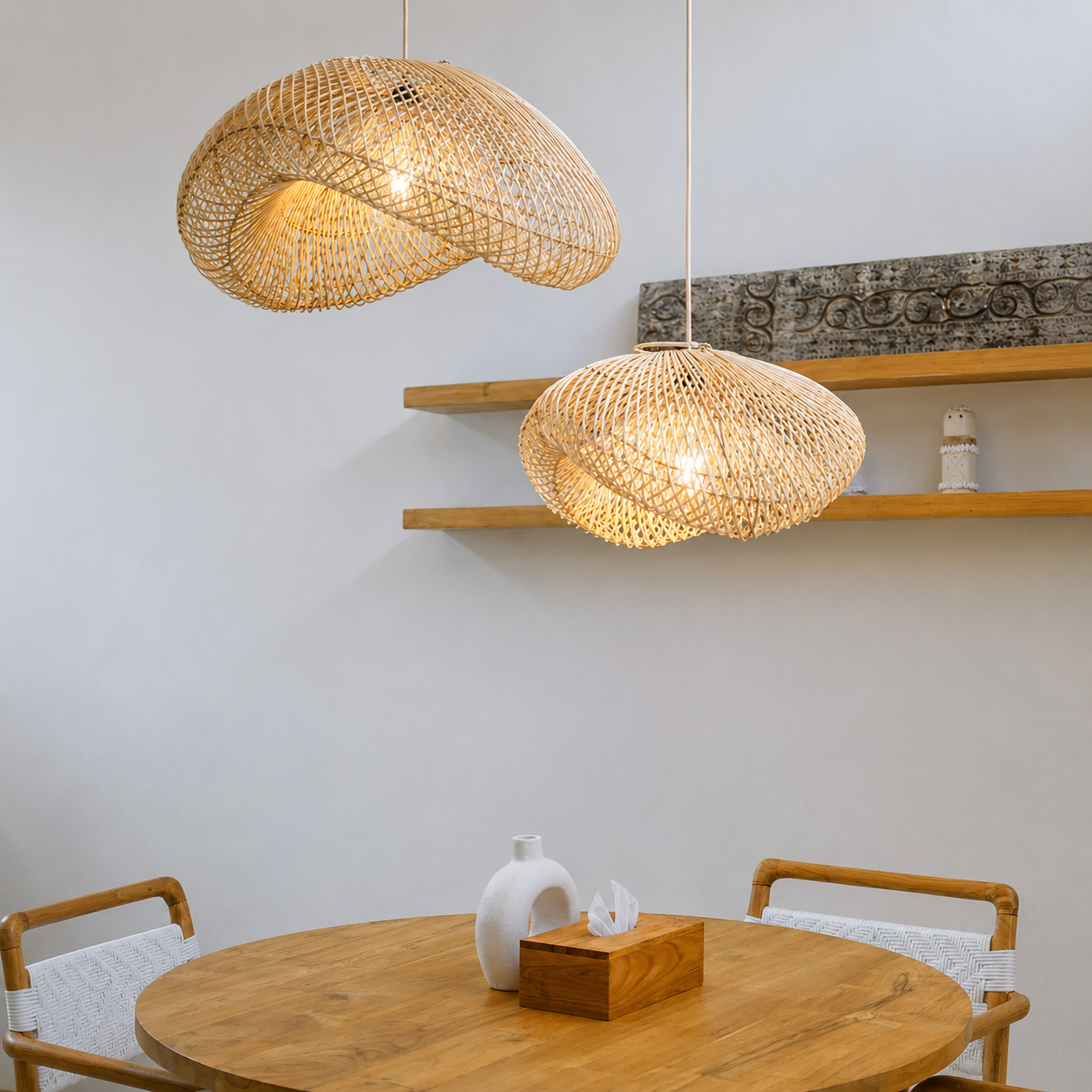 Natural rattan dome pendant light set with two woven dome shades.