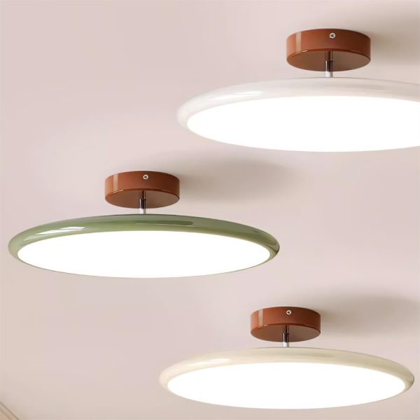 Tri-color flush mount ceiling light with white dome diffuser and dark bronze canopy