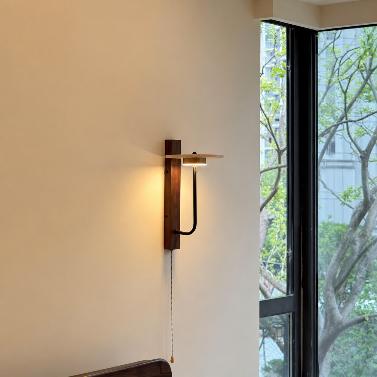 Vertical wood wall sconce with halo light cap and curved metal arm