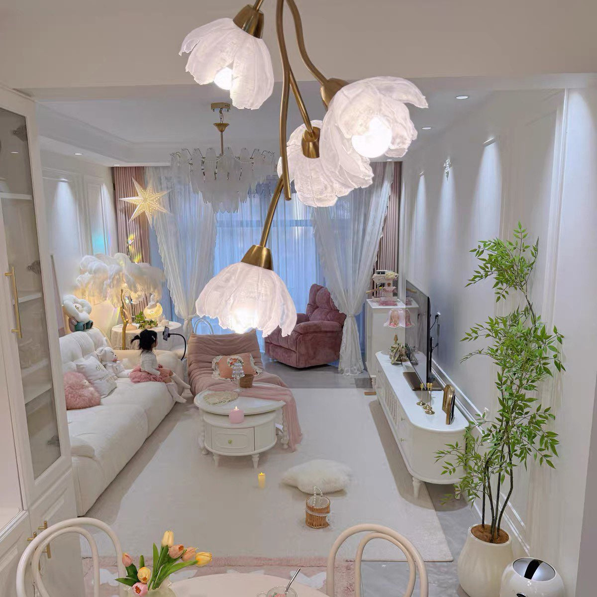Floral branch chandelier with gold arms and multiple white frosted flower shades