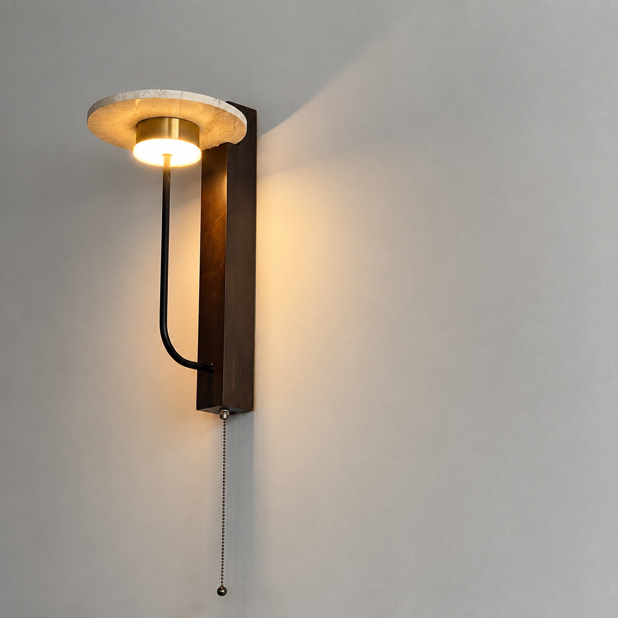 Wood and black wall sconce with circular halo shade and hanging pull chain