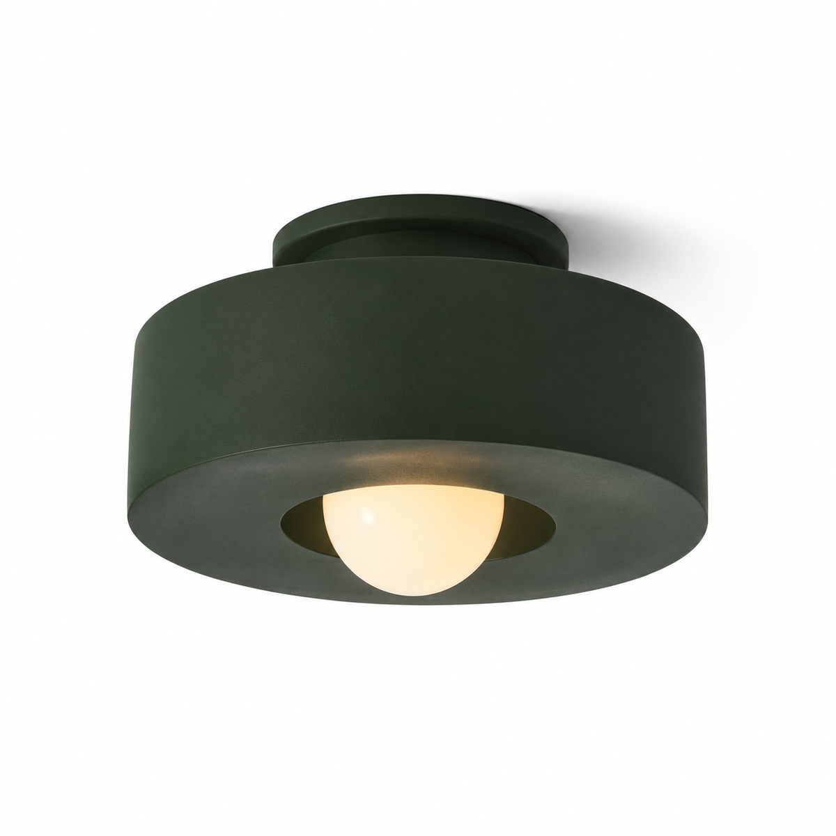Dark green resin flush mount light with wide circular shade and glowing bulb