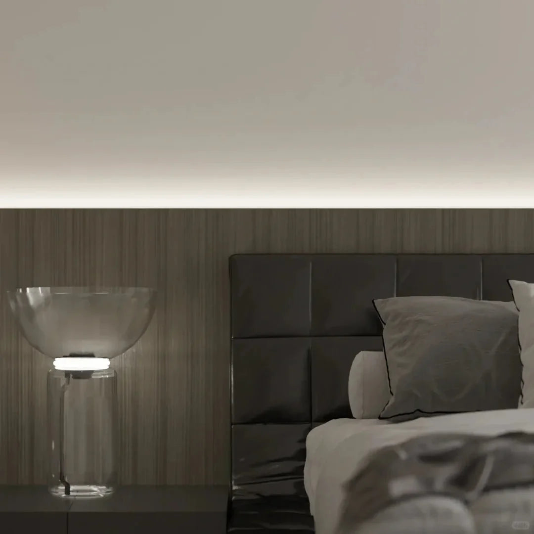Clear glass floor lamp top with chrome stem and black round base.