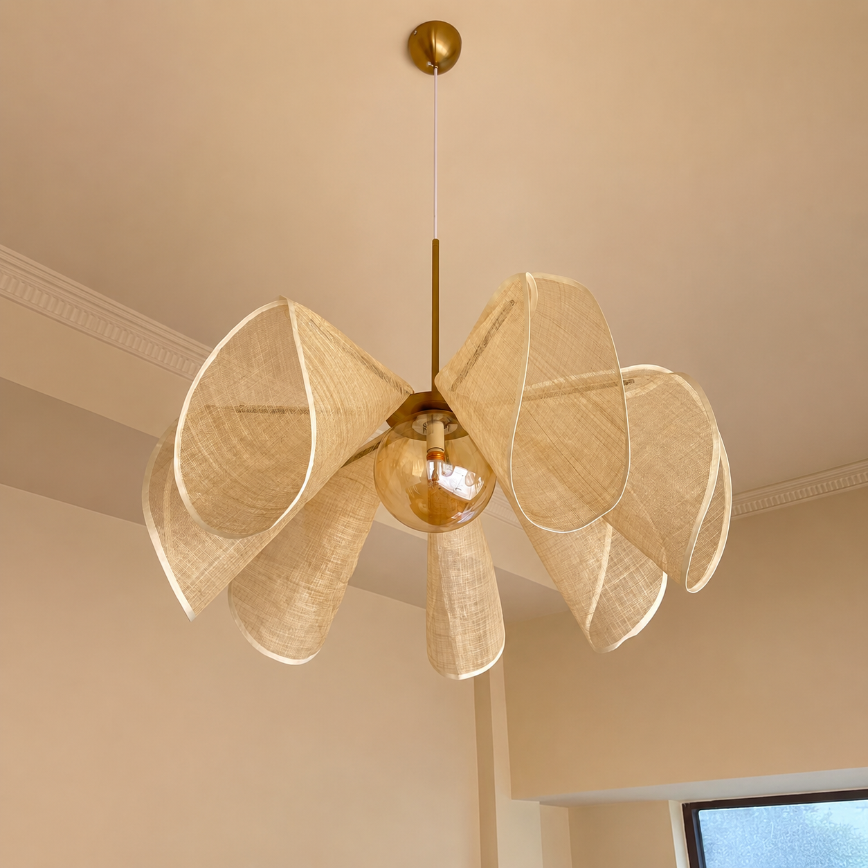 Natural linen petal chandelier with brass canopy and six fabric shades on a stem