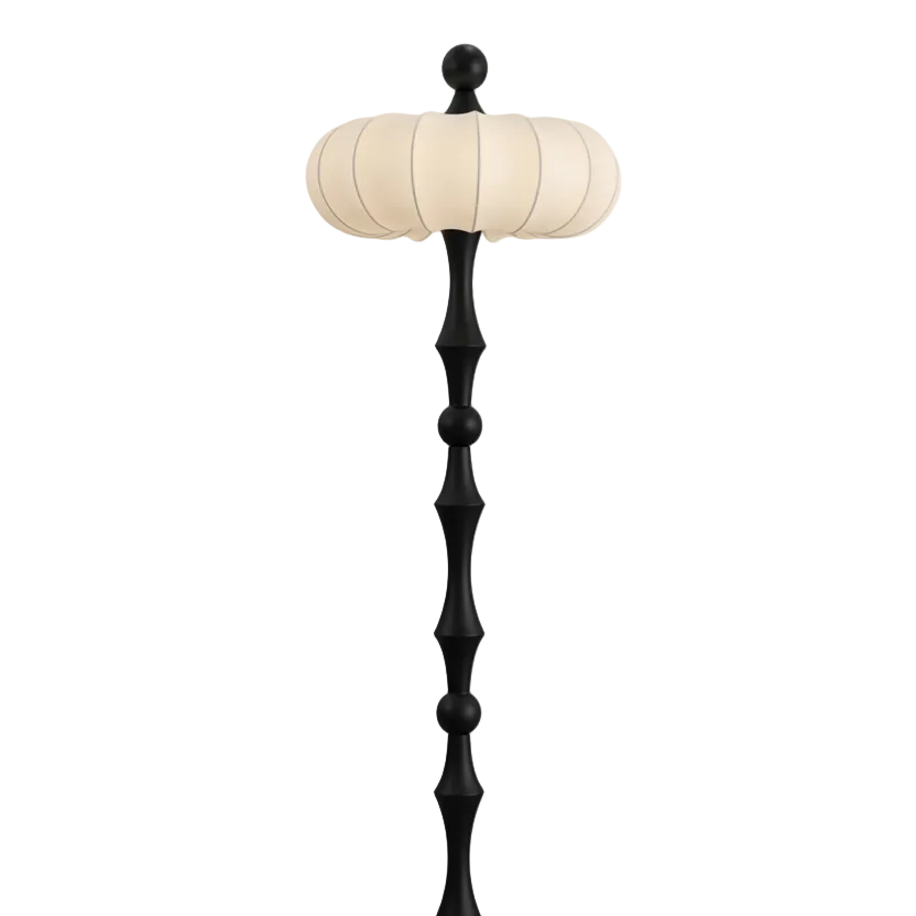 Modern floor lamp with cream ribbed drum shade and black stacked base