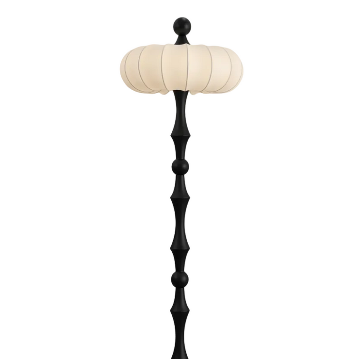 Modern floor lamp with cream ribbed drum shade and black stacked base